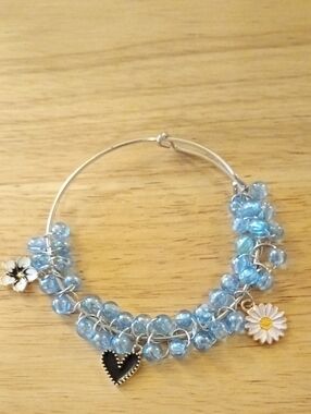 Light Blue Beaded Charm Bracelet with Flower and Heart Accents
